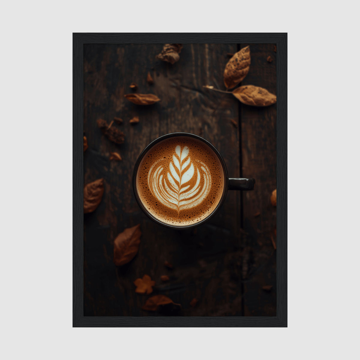 Framed Poster A4 Black Frame - Overhead view of latte coffee with white leaf latte art on dark wooden surface scattered with golden autumn leaves