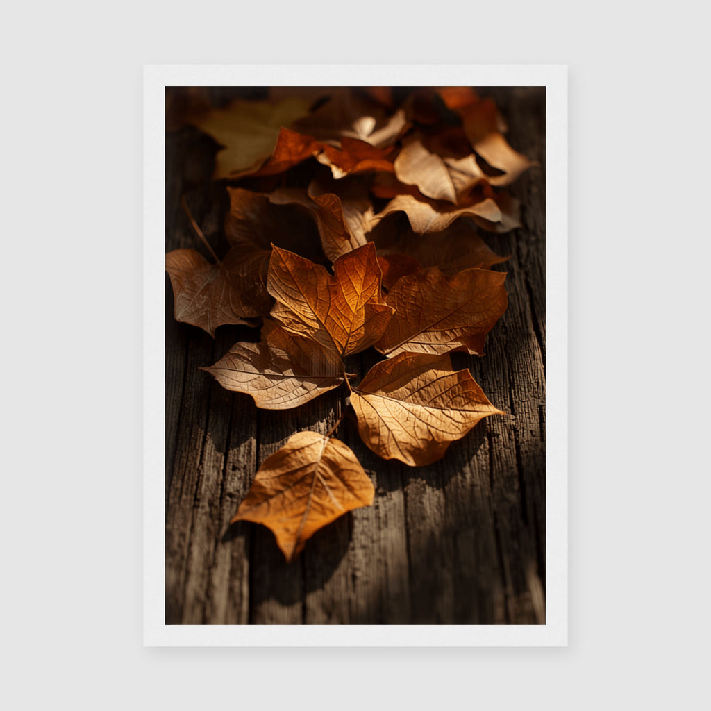 Framed Poster A4 Classic White Frame - Crunchy fall leaves in warm amber tones arranged artfully with natural shadows on rustic wood surface