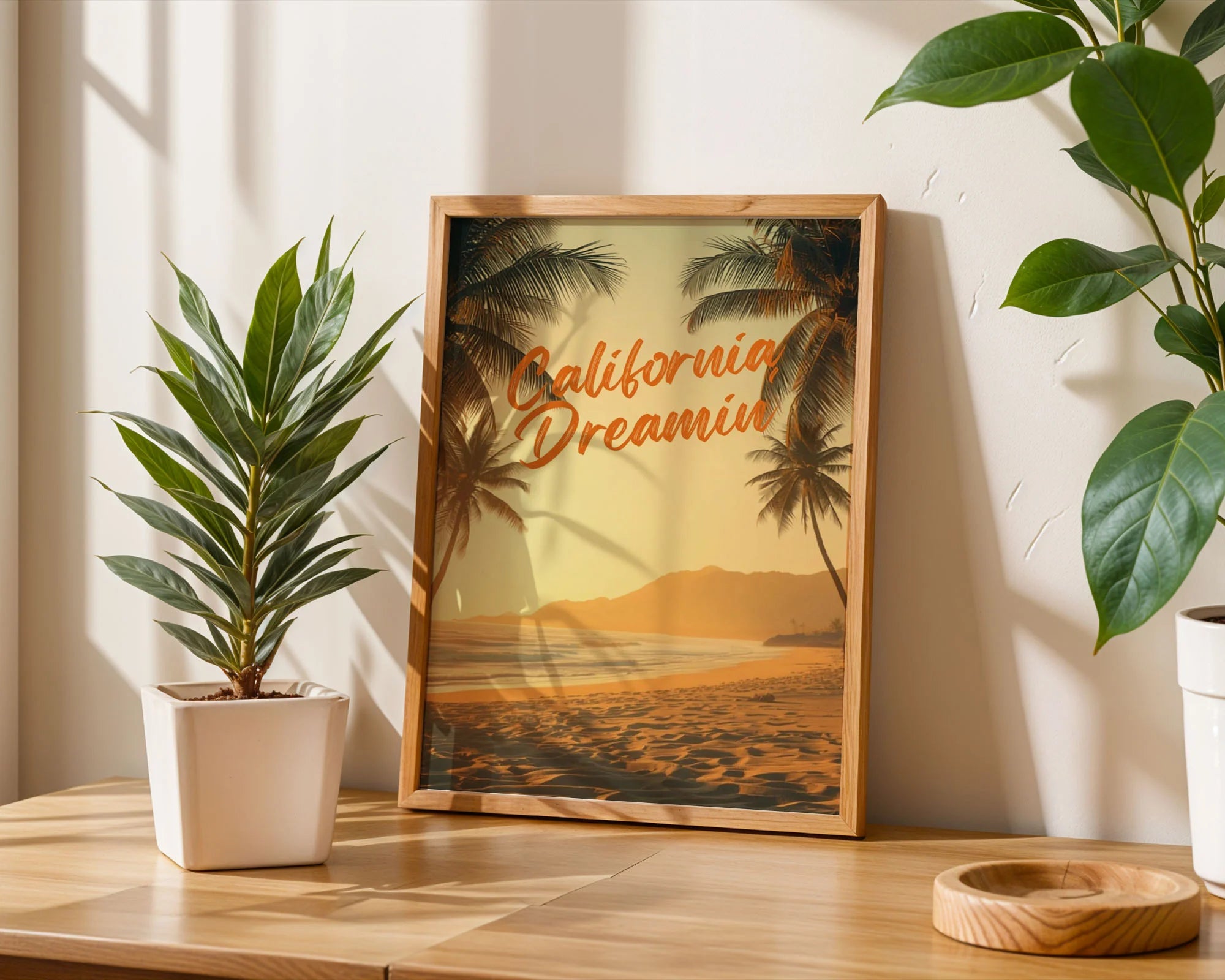 Framed Poster A4 Classic White Frame - Artistic beach scene with cursive orange lettering overlaid on tropical sunset with golden sand and ocean horizon